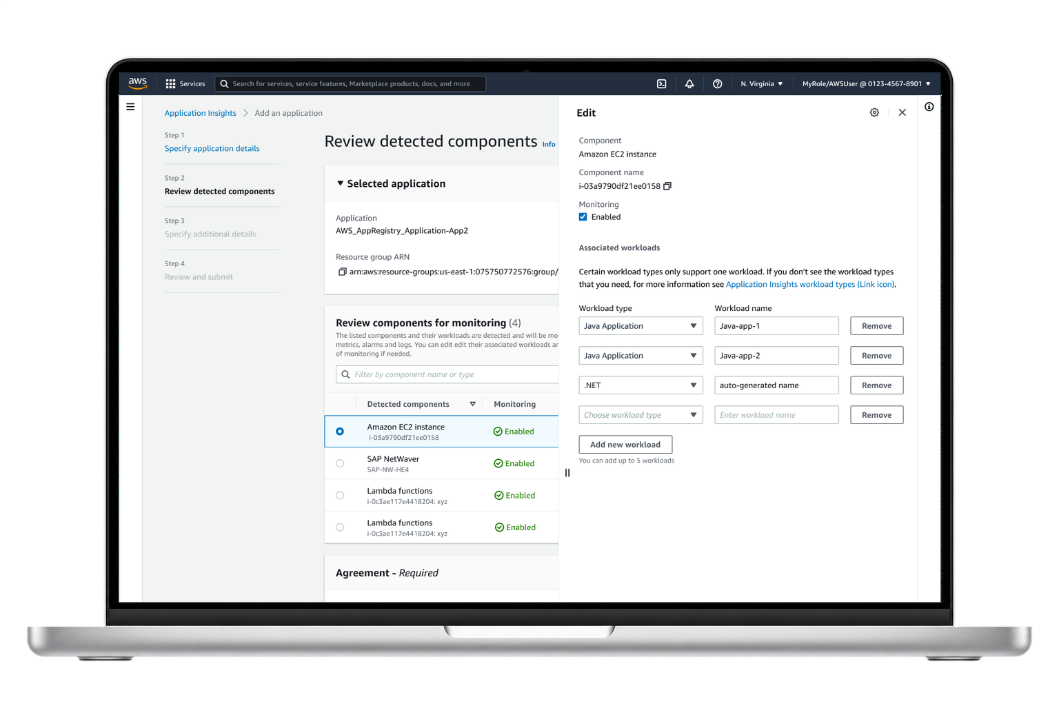 CloudWatch Application Insights workload configuration table shown in a MacBook mockup